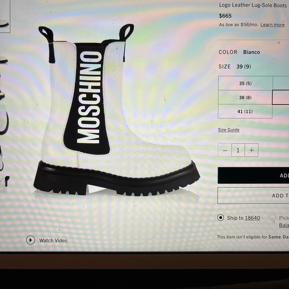 Moschino logo leather lug sole boots